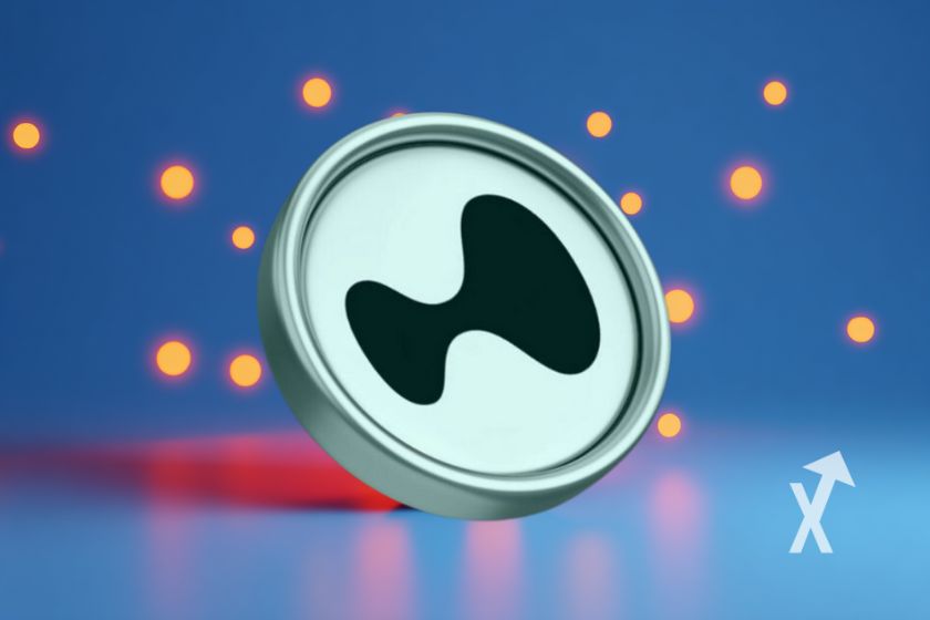 coin hyperliquid HYPE sur un fond bleu avec points jaunes