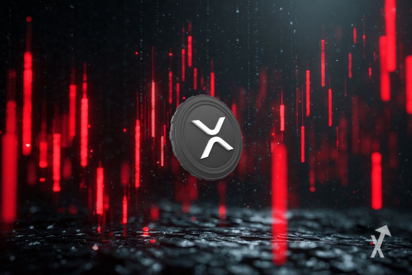 Le token XRP sur un fond sombre avec des bougies rouges