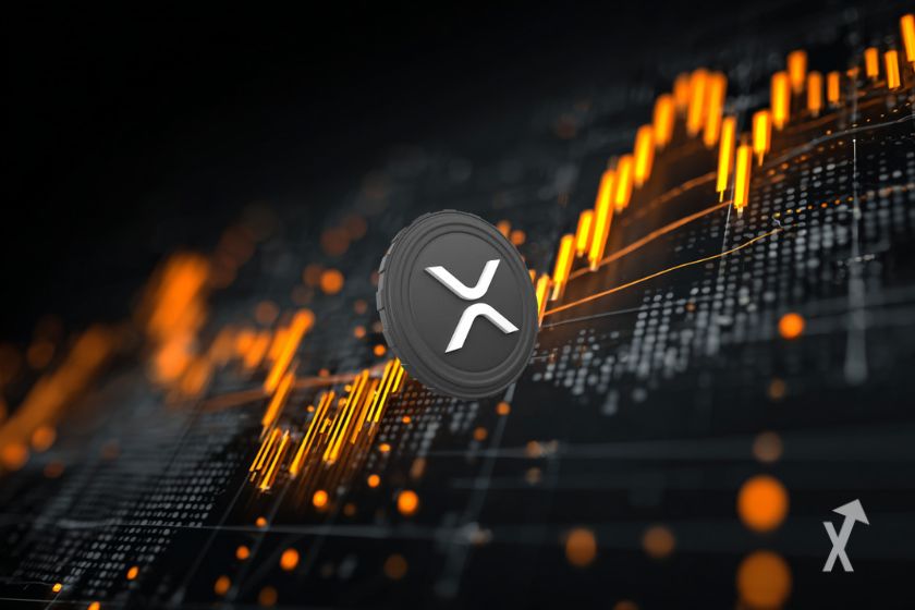 Le token gris de XRP sur un graphique technique avec des bougies oranges