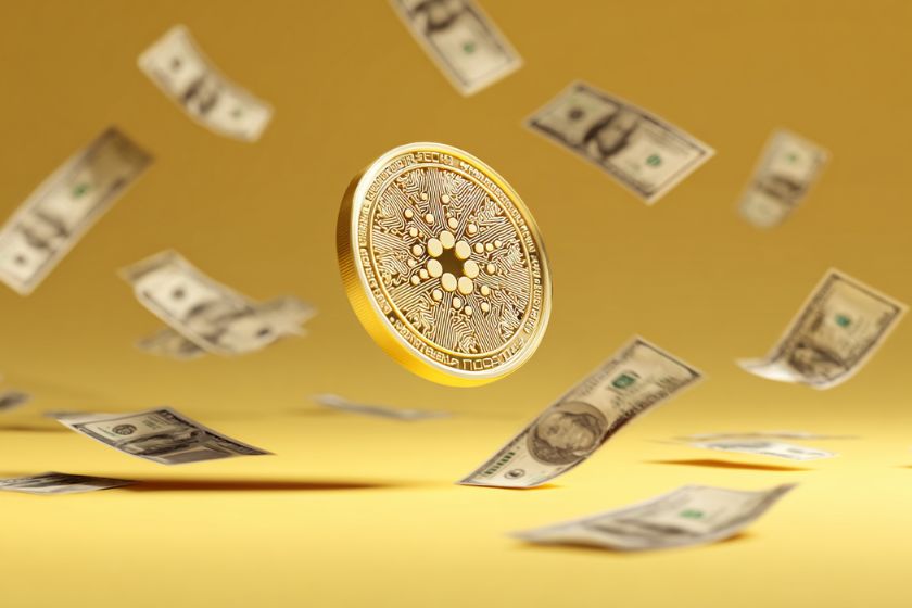 coin ADA de Cardano en jaune sur un fond jaune avec des billets dollars dans les airs