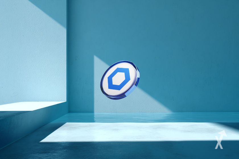Le token Chainlink au milieu d'une pièce peinte en bleue avec de l'ensoleillement