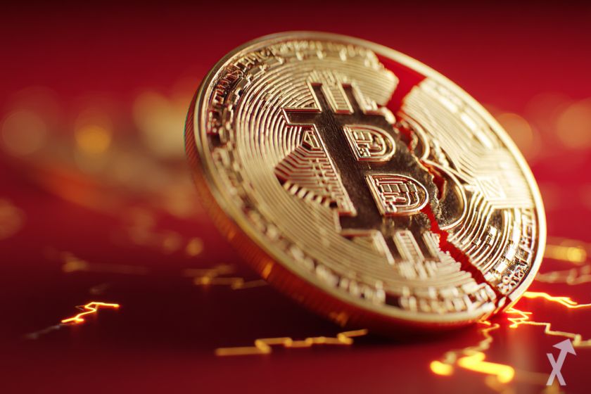 coin 3D bitcoin doré, fissuré dans un environnement rouge et jaune